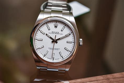 Rolex Oyster Perpetual 39 Ref. 114300 White Dial.